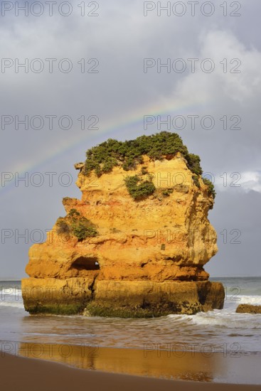 Rocks on beach with rainbow, Praia Dona Ana, Lagos, Algarve, Portugal