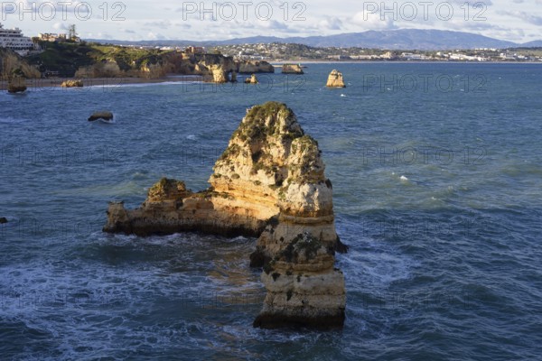 Rock formations on the coast, Praia do Camilo, Lagos, Algarve, Portugal