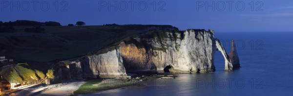 Cliff with the Falaise d'Aval rock gate and the Aiguille d'Etretat rock pin at night, Etretat, Alabaster Coast, Seine-Maritime, Normandy, France