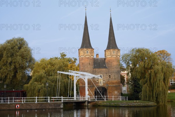 Oostpoort city gate and drawbridge on the Delftse Schie, Delft, South Holland, Netherlands