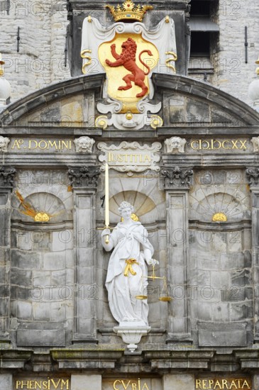Justice statue and coat of arms at Stadhuis or City Hall, Delft, South Holland, Netherlands