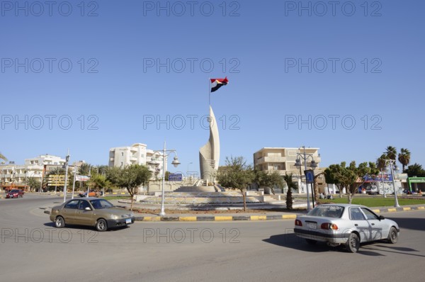 Roundabout with sculpture and Egyptian flag, Hurghada, Red Sea Governorates, Egypt