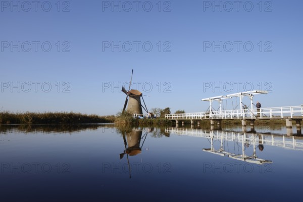 Historic windmill and drawbridge, UNESCO World Heritage Site, Kinderdijk, South Holland, Netherlands