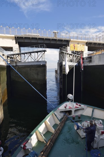 Nile cruise ship leaves the lock at the Esna dam, Esna, Egypt