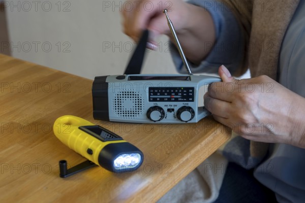 Emergency equipment, flashlight and radio with crank operation, by turning the crank we generate electricity in a dynamo, which charges a battery in the flashlight, radio, in addition a small solar module to generate electricity from sunlight, for emergency preparedness in the event of a power failure, blackout, energy supply
