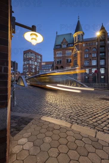 Road traffic in Speicherstadt at blue hour, Hamburg, Germany