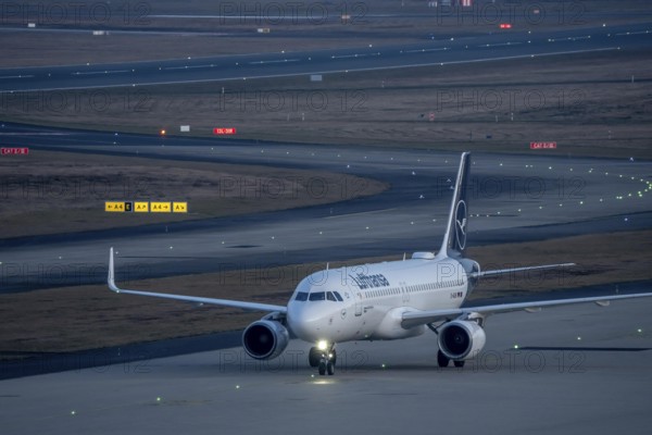 Lufthansa Airbus A320 after landing at Cologne/Bonn airport, on the taxiway to the terminal, North Rhine-Westphalia, Germany
