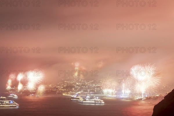 New Year's Eve fireworks, dusk, Atlantic Ocean, harbour with cruise ships, Funchal, Madeira, Portugal