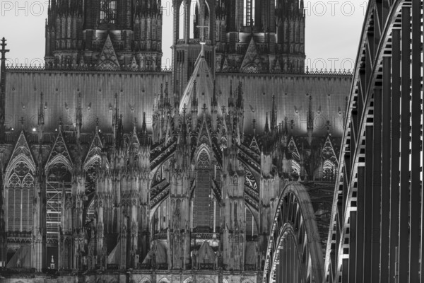 Evening atmosphere, Cologne Cathedral illuminated with LED lamps and the Hohenzollern Bridge, Cologne, North Rhine-Westphalia, Germany