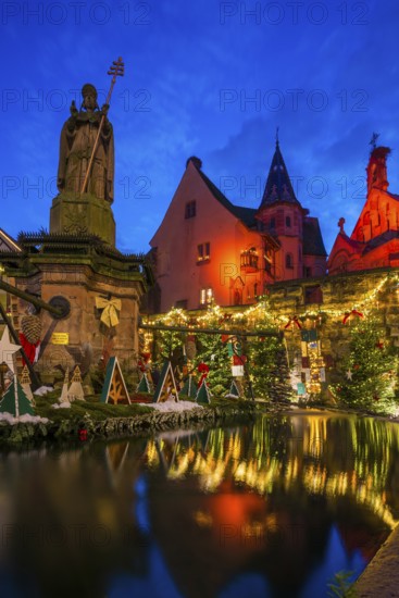 Houses illuminated and decorated for Christmas, Christmas market, blue hour, Eguisheim, Haut-Rhin department, Grand Est region, Alsace, France