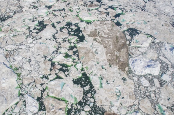 Aerial view of melting icepack and icebergs, Greenland (Kalaallit Nunaat), Arctic Ocean, climate change, global warming, geographically part of North America, politically part of the Kingdom of Denmark