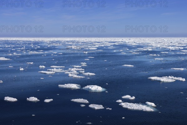 Drift ice, brash ice consists of ice floes in the Arctic Ocean around Svalbard, Spitsbergen in summer