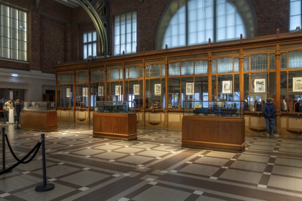Former ticket hall with ticket counters and offices of the Schaerbeek railway station at Train World, railway museum in Schaarbeek, Brussels, Belgium