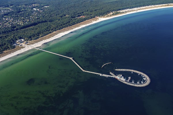 Aerial view over Seebrücke, pier and marina with boats at seaside resort Prerow along the Baltic Sea, Darß, Fischland, Mecklenburg-Vorpommern, Germany