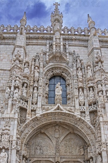 Ornate south portal of the Hieronymites Monastery / Mosteiro dos Jerónimos in Manueline style in Santa Maria de Belém, Lisbon / Lisboa, Portugal