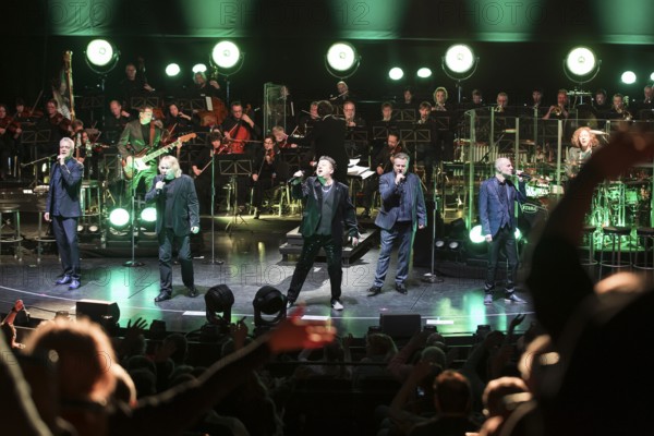 The Prinzen, consisting of the singers Jens Sembdner, Tobias Künzel, Sebastian Krumbiegel, Henri Schmidt and Wolfgang Lenk (from left to right) live on Symphonica Tour together with the Thüringen Philharmonie Gotha-Eisenach under the baton of conductor Christian Dellacher at Berlin's Friedrichstadtpalast on 19 January 2026