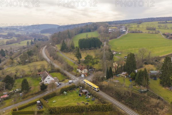 Aerial view of a hilly landscape with train, fields and small villages, acceptance of the Hermann Hesse Railway, Calw, Black Forest, Germany