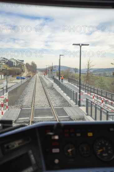 View from a train window of an empty railway line under the open sky, taking the Hermann Hesse Railway, Calw, Black Forest, Germany