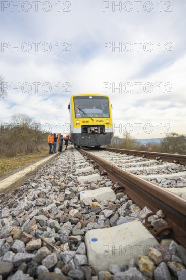 Close-up of a train on the rails with passengers nearby, acceptance of the Hermann Hesse Railway, Calw, Black Forest, Germany