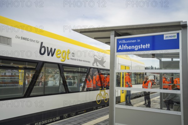 Passengers board a train at Althengstett station, taken by the Hermann Hesse Railway, Calw, Black Forest, Germany
