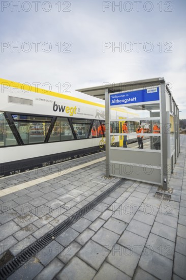 A regional train on the platform in Althengstett with waiting passengers, acceptance of the Hermann Hesse Railway, Calw, Black Forest, Germany