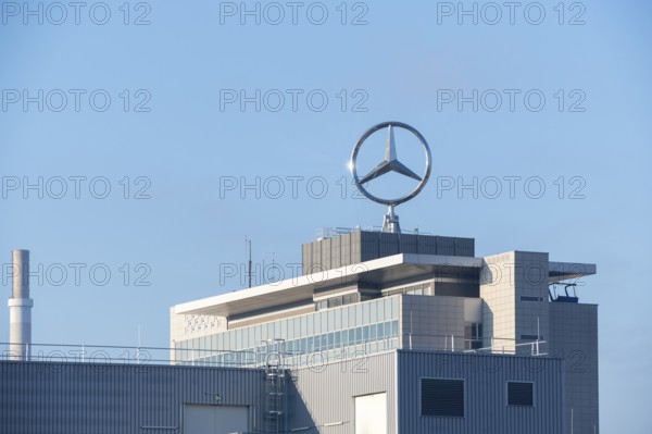 Close-up of a building with prominent Mercedes logo and chimney under a blue sky, Mercedes Star, Stuttgart-Untertürkheim, Baden-Württemberg, Germany