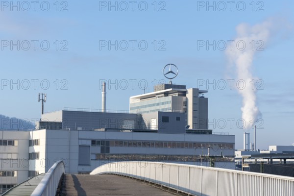 Building with Mercedes logo and rising steam, bridge in the foreground, Mercedes Star, Stuttgart-Untertürkheim, Baden-Württemberg, Germany