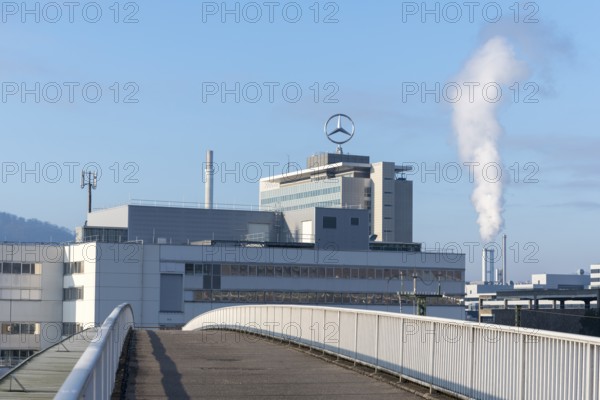 Building with Mercedes logo and rising steam in the background under a clear sky, Mercedes star, bridge, Stuttgart-Untertürkheim, Baden-Württemberg, Germany