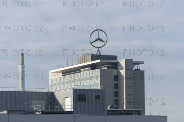 Noticeable Mercedes-Benz logo on modern industrial building against cloudy sky, Mercedes Star, Stuttgart-Untertürkheim, Baden-Württemberg, Germany