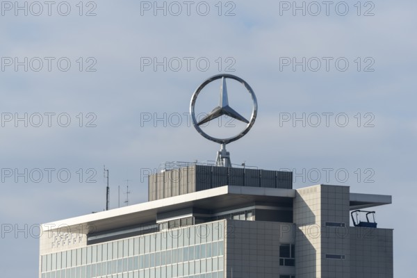 Mercedes-Benz logo over modernly designed building and cloudy sky, Mercedes Star, Stuttgart-Untertürkheim, Baden-Württemberg, Germany