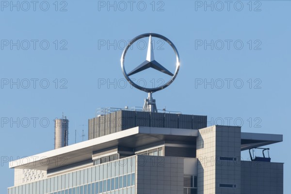 Close-up of a roof with emblazoned Mercedes logo and chimney surrounded by blue sky, Mercedes star, Stuttgart-Untertürkheim, Baden-Württemberg, Germany