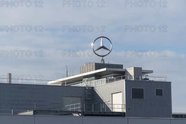 Large industrial complex with Mercedes-Benz logo under cloudy sky, Mercedes Star, Stuttgart-Untertürkheim, Baden-Württemberg, Germany