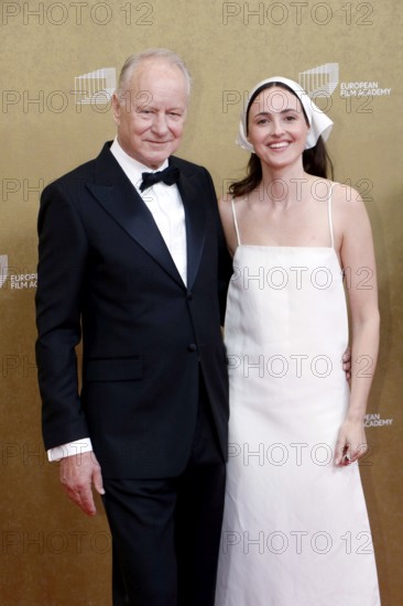 Stellan Skarsgård and Renate Reinsve arriving for the European Film Awards at the House of World Cultures in Berlin on 17.01.2026