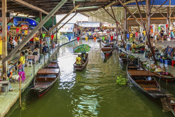 Wooden boats on the Damneon Saduak floating markets channel, near Bangkok, Ratchaburi district, Thailand