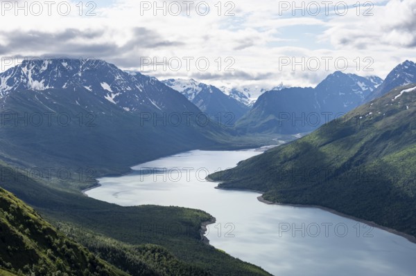 View of blue lake and mountains on Twin Peaks Trail, Eklutna Lake, Chugach Mountains, Chugach State Park, Alaska, USA