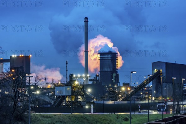 Hüttenwerke Krupp-Mannesmann, HKM in Duisburg, coking plant, fire tower with fire cloud, marshalling yard tracks, North Rhine-Westphalia, Germany