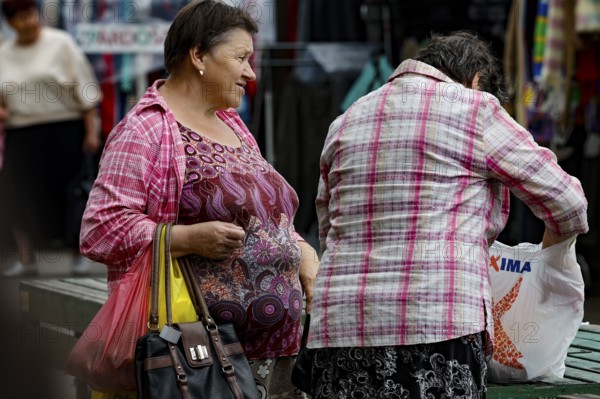 Two woman talking at Riga Central Market, Riga, Central Market, Latvia