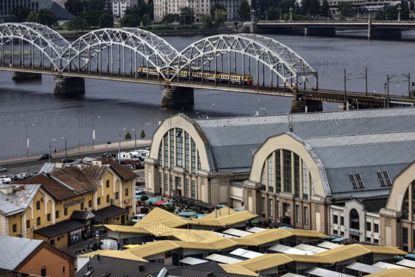View of the distinctive bridge and central market in Riga, Riga, Latvia, Latvia