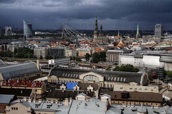 View of Riga with a combination of market buildings and distinctive church towers, Riga, Latvia, Latvia