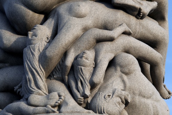 Detailed granite monolith with interlocking human figures, Oslo, Norway
