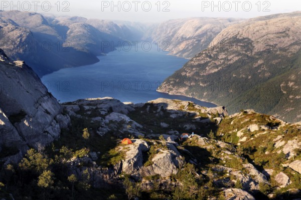 A stunning view of the deep blue Lysefjord from the heights of Preikestolen, Lysefjord, Rogaland, Norway