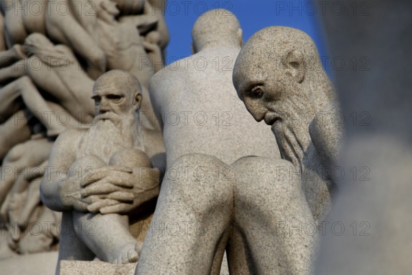Granite figures interacting thoughtfully, part of the sculpture park, Oslo, Norway