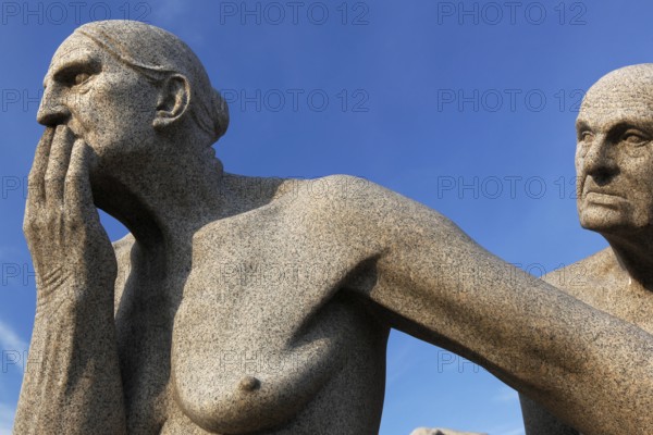 Two granite figures depict thoughtful and complex interaction, Oslo, Norway