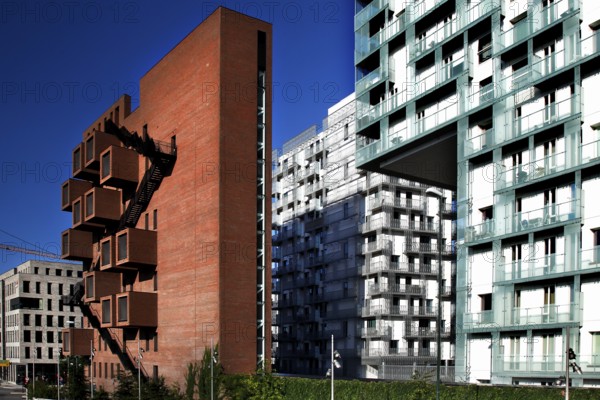 Modern new buildings in Oslo with brick and glass facades under clear blue skies, Oslo, Bydel Gamle Oslo, Norway
