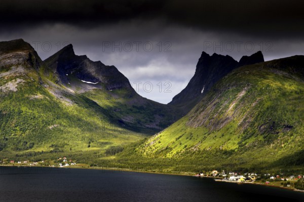 Impressive mountain landscape with impressive light incidence in Bergsbotn, Senja, Norway