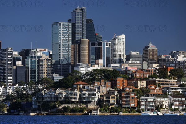Urban skyline with residential buildings and water views of Cremone Point, Sydney, New South Wales, Australia