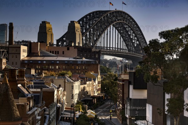 View from Cahill Expressway of Harbour Bridge and historic buildings in The Rocks, Sydney, New South Wales, Australia