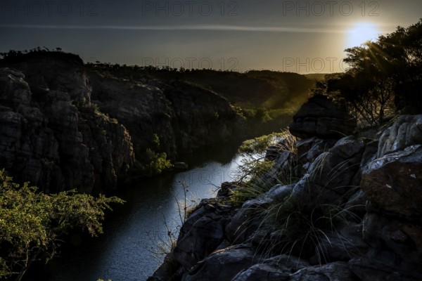 Dramatic gorge with river at sunset, captivating and mysterious atmosphere, zero