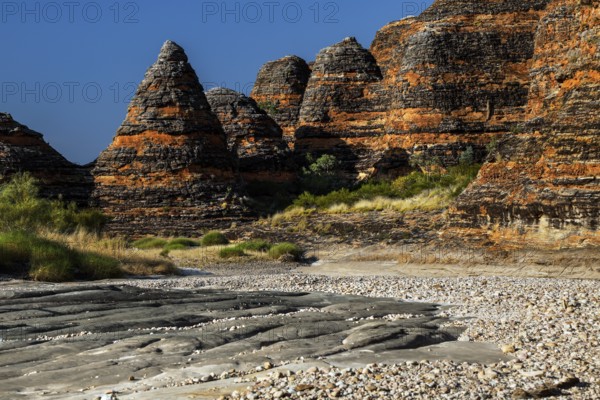 Fascinating rock formations along the Piccaninny Lookout Trail under bright skies, Purnululu National Park, Western Australia, Australia