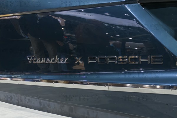 Frauscher x PORSCHE logo on luxurious 790 Spectre sports boat at Messe Boot, Düsseldorf, North Rhine-Westphalia, Germany